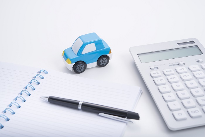 Toyota financing materials including calculator and toy car