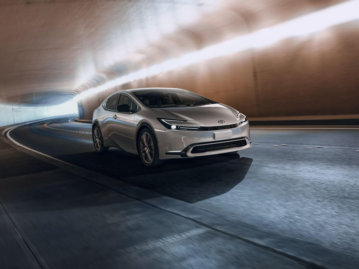 A Toyota lease car driving in a tunnel